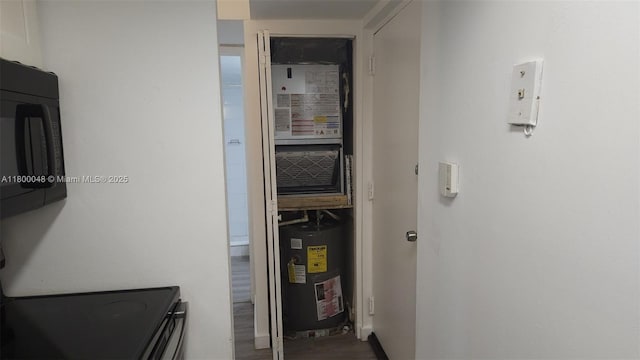 1720 NW N River Dr Unit 113, Miami, FL 33125 - utility room with water heater