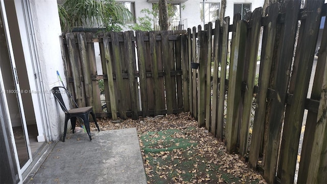 1720 NW N River Dr Unit 113, Miami, FL 33125 - view of patio / terrace featuring fence