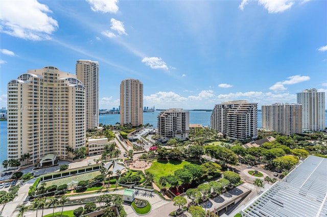 view of urban area with a large body of water
