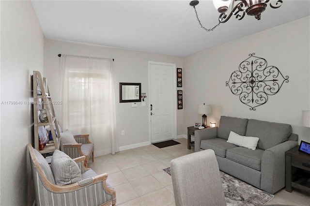 8897 SW 229th St, Cutler Bay, FL 33190 - living area with light tile patterned floors, a chandelier, and baseboards
