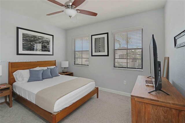 8897 SW 229th St, Cutler Bay, FL 33190 - bedroom featuring light carpet, baseboards, and a ceiling fan
