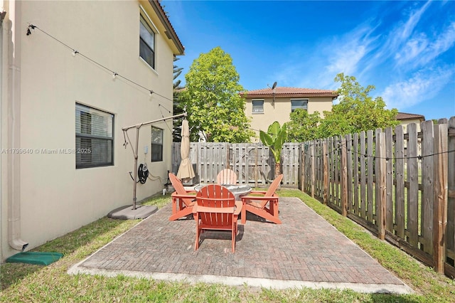 8897 SW 229th St, Cutler Bay, FL 33190 - view of patio with a fenced backyard