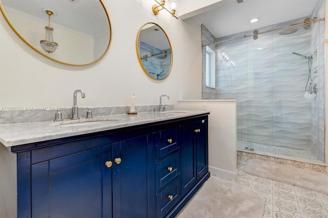 bathroom featuring a shower stall, tile patterned floors, and double vanity