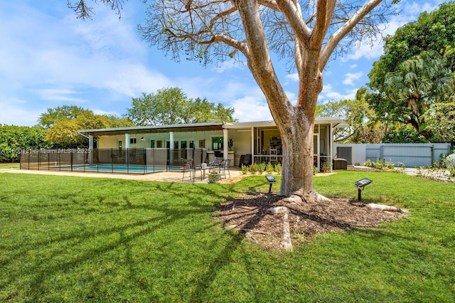 rear view of property featuring a patio
