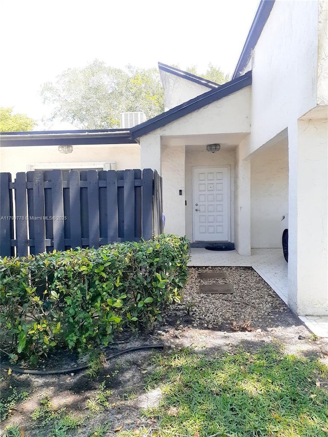16023 S Fairway Ter Unit 118, Weston, FL 33326 - doorway to property featuring stucco siding