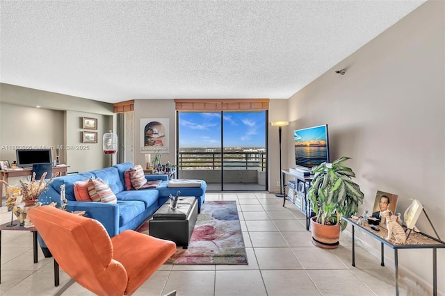 3300 NE 191st St Unit Lp04, Aventura, FL 33180 - tiled living area featuring a textured ceiling