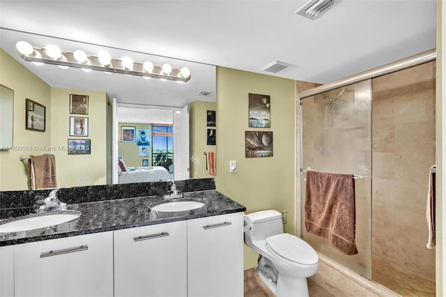 3300 NE 191st St Unit Lp04, Aventura, FL 33180 - bathroom with ensuite bathroom, double vanity, a stall shower, and toilet