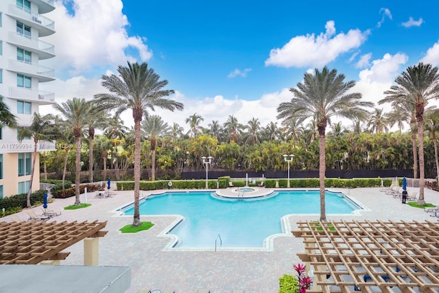 1745 E Hallandale Beach Blvd Unit 1903W, Hallandale Beach, FL 33009 - community pool featuring a patio area, a community hot tub, and fence