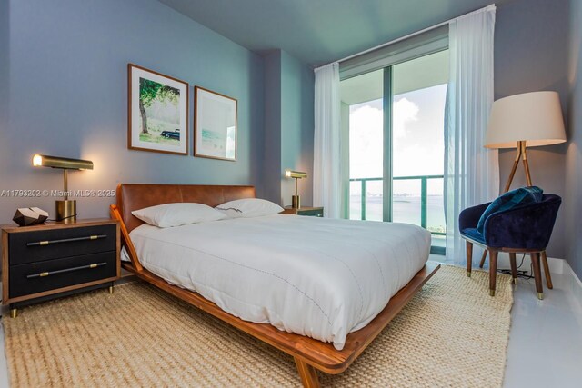 501 NE 31st St Unit 2906, Miami, FL 33137 - bedroom with multiple windows and access to exterior