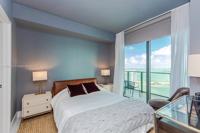 501 NE 31st St Unit 2906, Miami, FL 33137 - bedroom with access to exterior and a water view