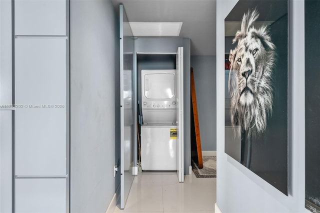 501 NE 31st St Unit 2906, Miami, FL 33137 - washroom featuring stacked washer / drying machine and baseboards