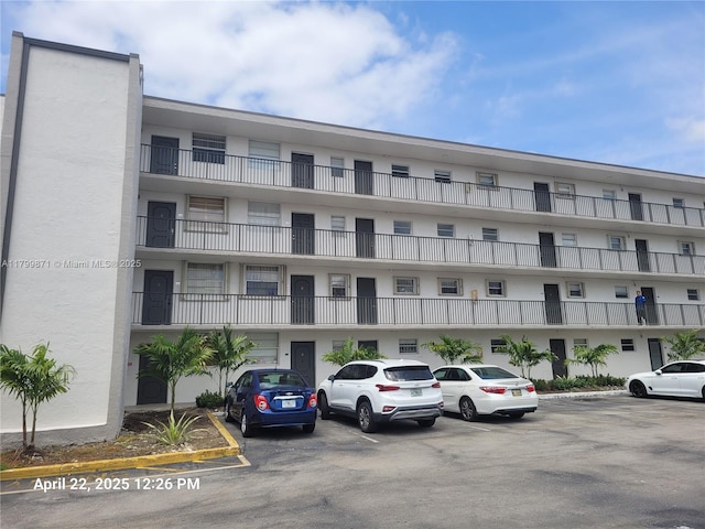 14140 SW 84th St Unit 301-H, Miami, FL 33183 - view of apartment building / complex with uncovered parking