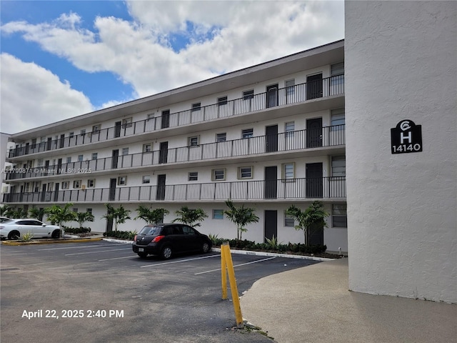 14140 SW 84th St Unit 301-H, Miami, FL 33183 - view of apartment building / complex featuring uncovered parking