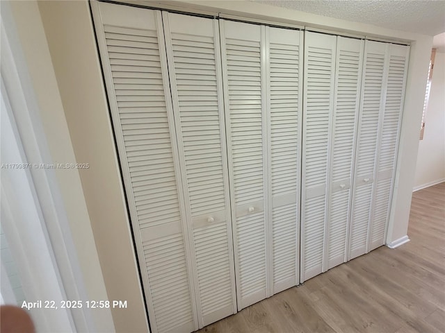 14140 SW 84th St Unit 301-H, Miami, FL 33183 - detailed view of wood finished floors and baseboards