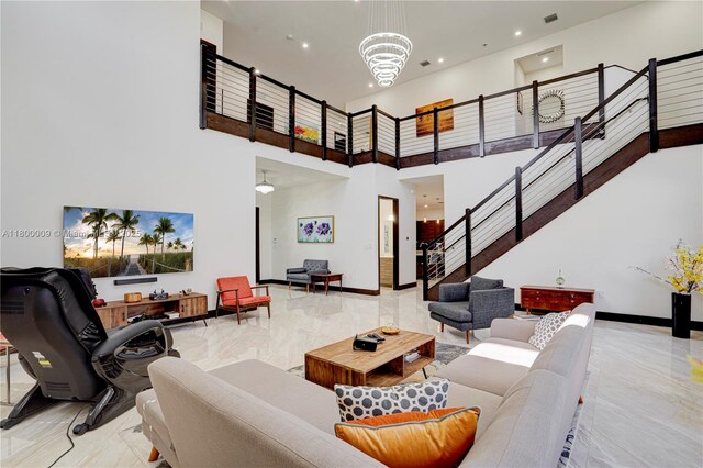 9015 NW 161st Ter, Miami Lakes, FL 33018 - community lobby with stairway, a towering ceiling, and recessed lighting