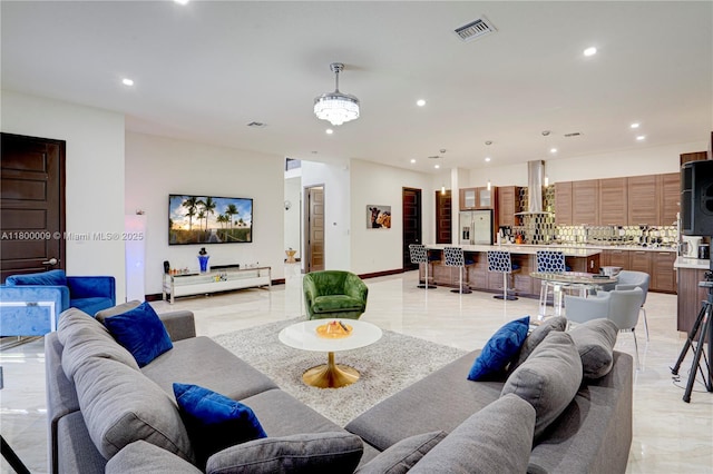9015 NW 161st Ter, Miami Lakes, FL 33018 - living area with recessed lighting and baseboards
