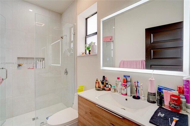 9015 NW 161st Ter, Miami Lakes, FL 33018 - full bath featuring a shower stall, toilet, and vanity