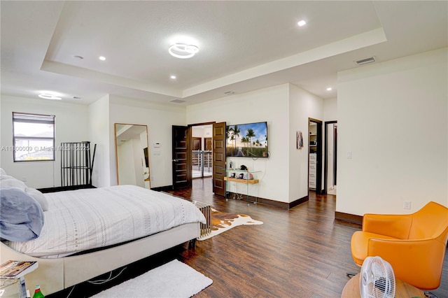 9015 NW 161st Ter, Miami Lakes, FL 33018 - bedroom with a raised ceiling, wood finished floors, baseboards, and recessed lighting