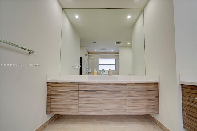 9015 NW 161st Ter, Miami Lakes, FL 33018 - bathroom with vanity, a shower stall, recessed lighting, and baseboards