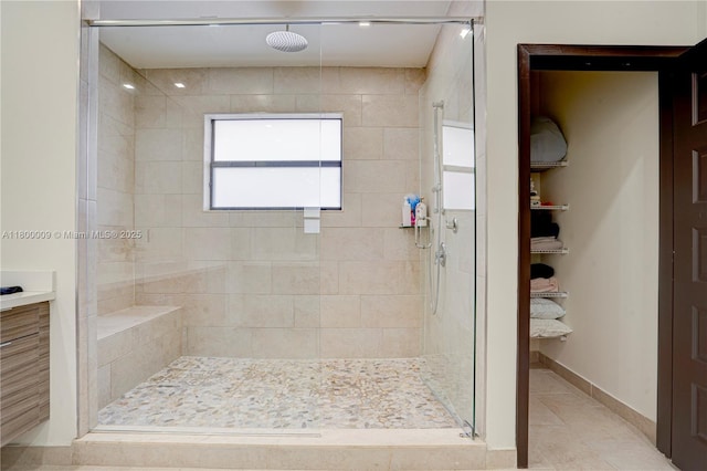 9015 NW 161st Ter, Miami Lakes, FL 33018 - full bathroom with a shower stall, tile patterned floors, and baseboards