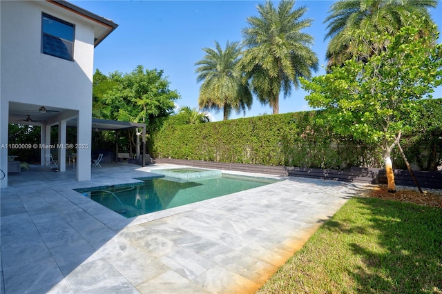 9015 NW 161st Ter, Miami Lakes, FL 33018 - view of pool with a patio area, a fenced backyard, and a ceiling fan