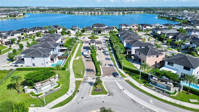 9015 NW 161st Ter, Miami Lakes, FL 33018 - aerial view of residential area with a nearby body of water