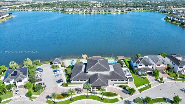9015 NW 161st Ter, Miami Lakes, FL 33018 - aerial view of residential area featuring a nearby body of water