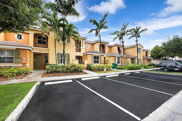 2252 NE 42nd Cir, Homestead, FL 33033 - uncovered parking lot featuring a residential view