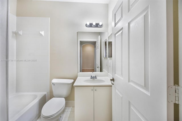 2252 NE 42nd Cir, Homestead, FL 33033 - full bathroom with toilet, vanity, tile patterned floors, and baseboards