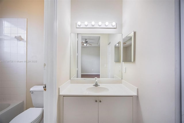 2252 NE 42nd Cir, Homestead, FL 33033 - bathroom featuring a ceiling fan, toilet, vanity, and bathing tub / shower combination