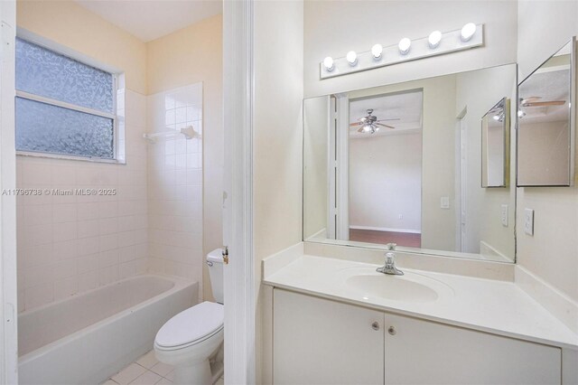 2252 NE 42nd Cir, Homestead, FL 33033 - full bathroom with ceiling fan, toilet, vanity, tub / shower combination, and tile patterned flooring