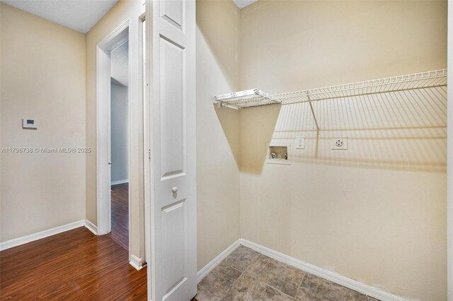 2252 NE 42nd Cir, Homestead, FL 33033 - laundry area featuring washer hookup, baseboards, and wood finished floors
