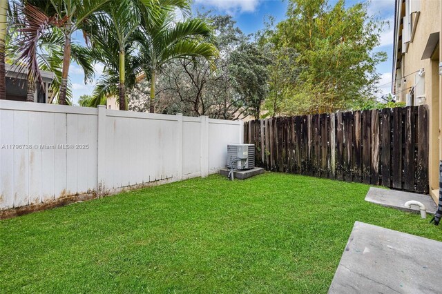 2252 NE 42nd Cir, Homestead, FL 33033 - view of yard with central AC
