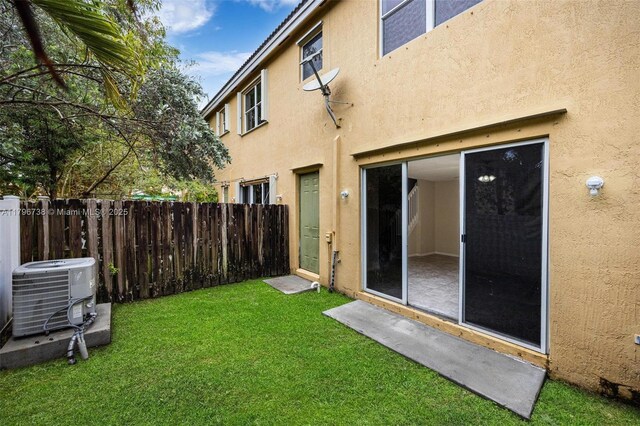 2252 NE 42nd Cir, Homestead, FL 33033 - view of yard with central air condition unit