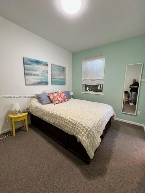 1614 Pennsylvania Ave Unit 2I, Miami Beach, FL 33139 - bedroom with carpet and baseboards