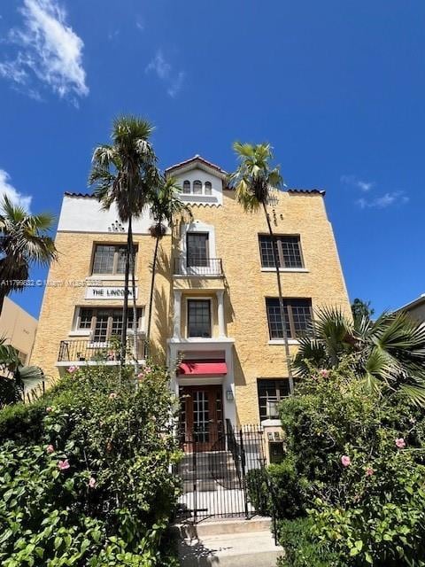 1614 Pennsylvania Ave Unit 2I, Miami Beach, FL 33139 - view of building exterior featuring fence