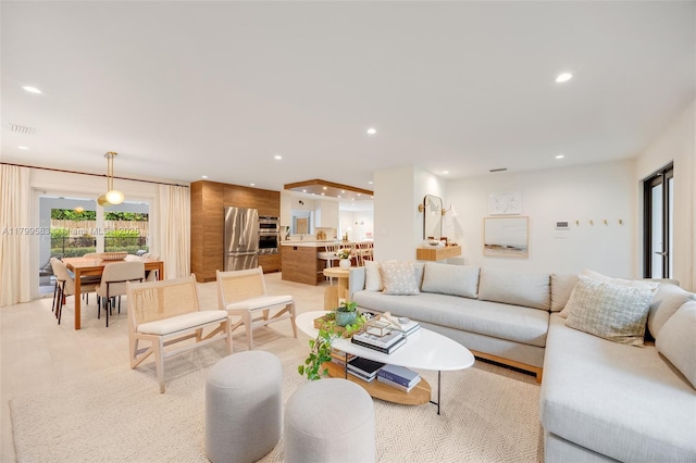 living room with recessed lighting