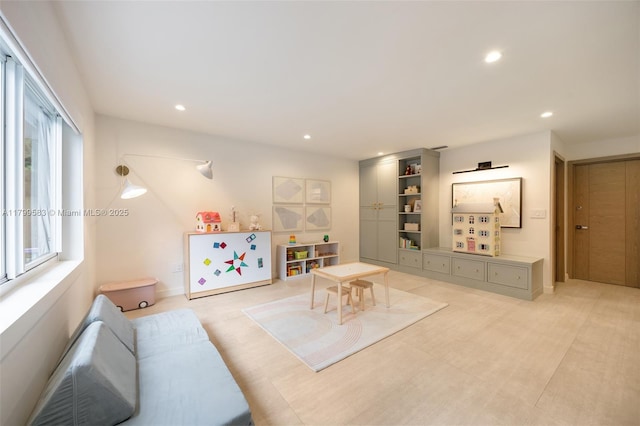 living area with recessed lighting