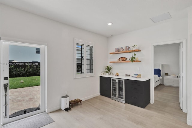 14836 SW 162nd St, Miami, FL 33187 - indoor dry bar featuring beverage cooler, light wood finished floors, and recessed lighting