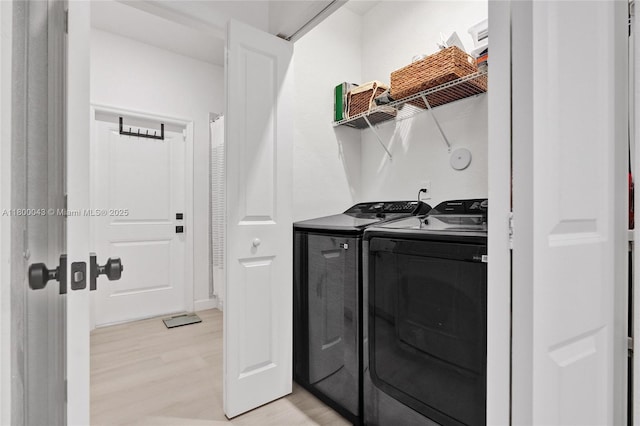 14836 SW 162nd St, Miami, FL 33187 - washroom with washer and dryer and light wood-style flooring