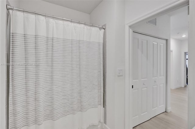 14836 SW 162nd St, Miami, FL 33187 - bathroom with wood finished floors, a shower with shower curtain, and recessed lighting