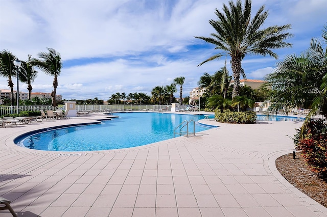 37 E Harbour Isle Dr E Unit 206, Fort Pierce, FL 34949 - community pool with fence and a patio