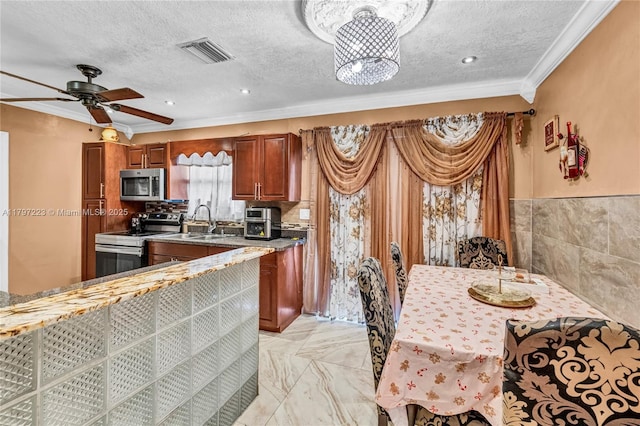 1480 SW 5th Ave, Deerfield Beach, FL 33441 - kitchen featuring stainless steel appliances, ornamental molding, a textured ceiling, a sink, and brown cabinetry