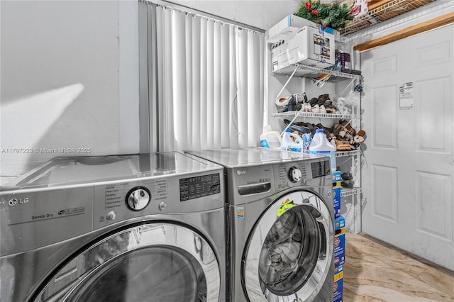 1480 SW 5th Ave, Deerfield Beach, FL 33441 - washroom featuring washing machine and clothes dryer and marble finish flooring