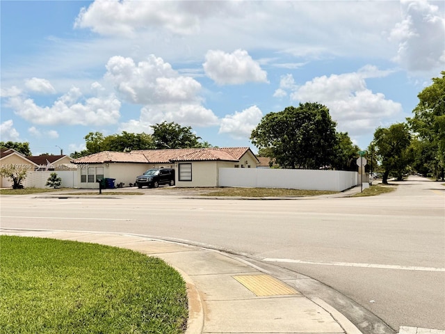 5730 NW 199th St, Hialeah, FL 33015 - view of asphalt street featuring sidewalks and curbs