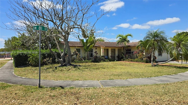 12900 SW 81st St, Kendall, FL 33183 - view of front facade with a front yard