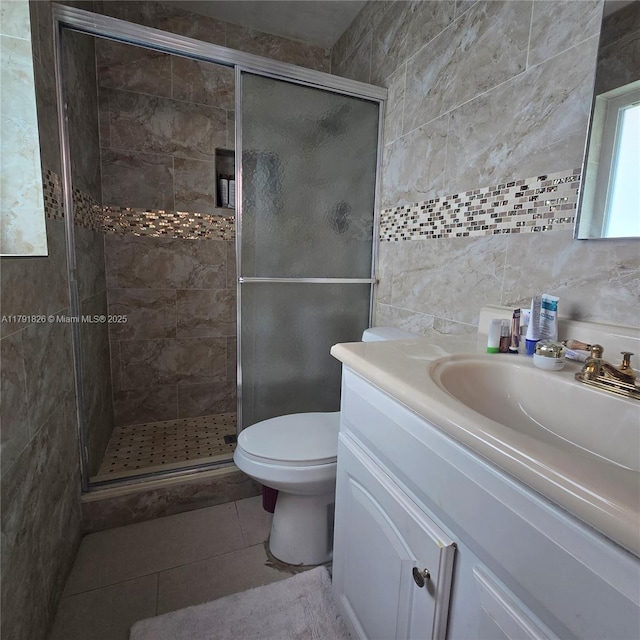 12900 SW 81st St, Kendall, FL 33183 - full bath with a stall shower, vanity, tile walls, toilet, and tile patterned floors