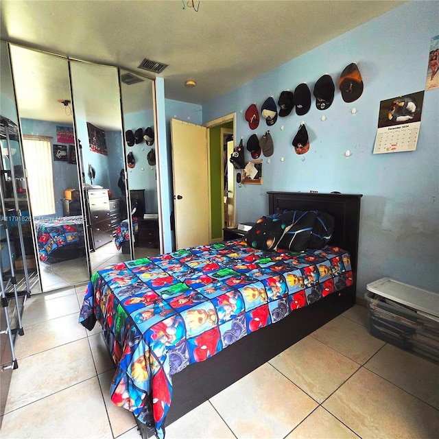 12900 SW 81st St, Kendall, FL 33183 - bedroom with tile patterned flooring and a closet