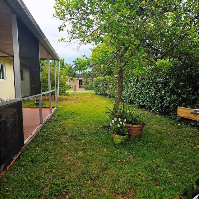 12900 SW 81st St, Kendall, FL 33183 - view of yard featuring a sunroom