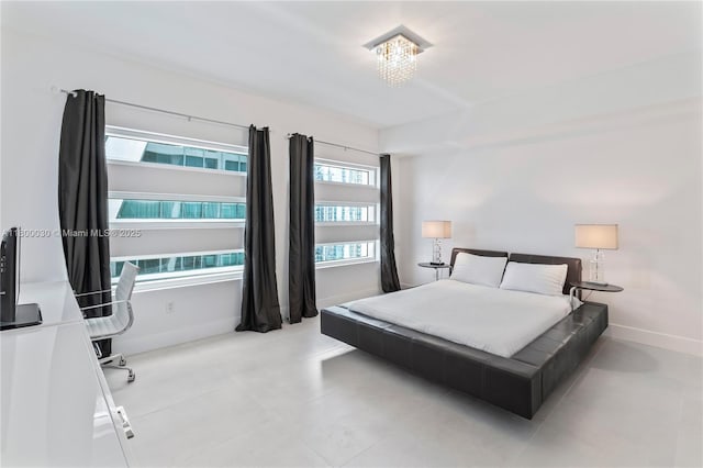 1040 Biscayne Blvd Unit 3802, Miami, FL 33132 - tiled bedroom with baseboards